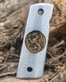 Incredibly detailed dragon-engraved 1911 grips