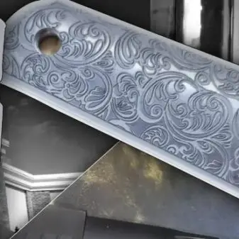 Scroll-engraved 1911 Grips